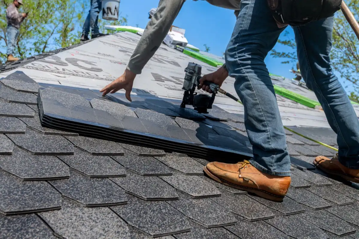 Inspecting an asphalt shingle slope after a hailstorm in McAllen, TX