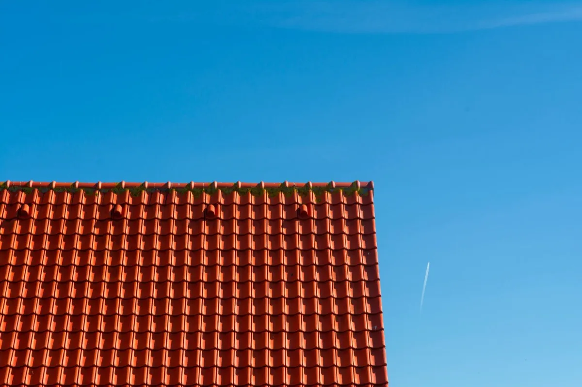 Tile roof gable in full sun, the kind of exposure that sets roof life in McAllen, TX